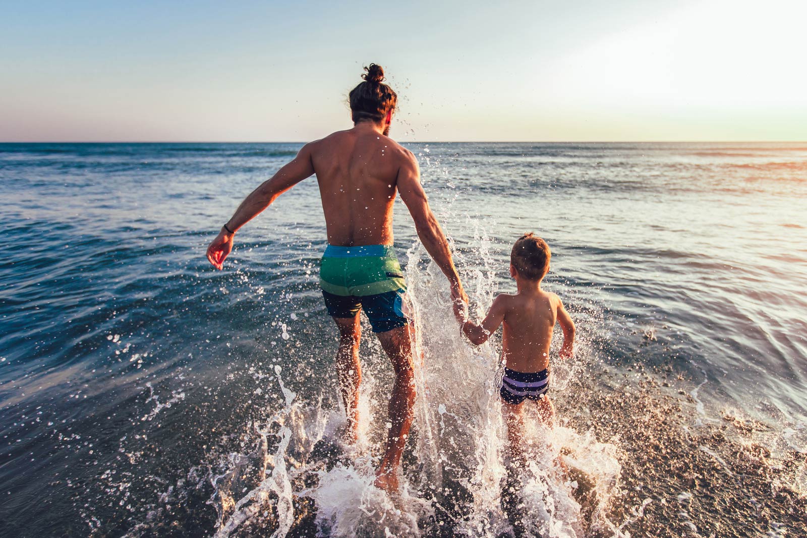 A father with his child at the beach